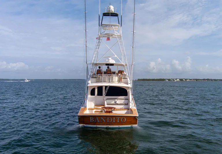 Bandito Yacht Photos Pics Viking 70 Convertible 2015 yacht "Bandito" on open water, rear view.