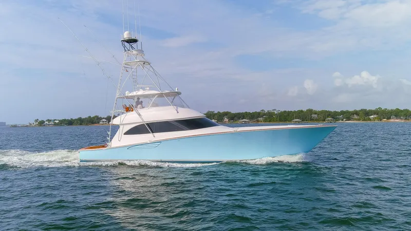 Bandito Yacht Photos Pics 2015 Viking 70 Convertible yacht cruising on open water.