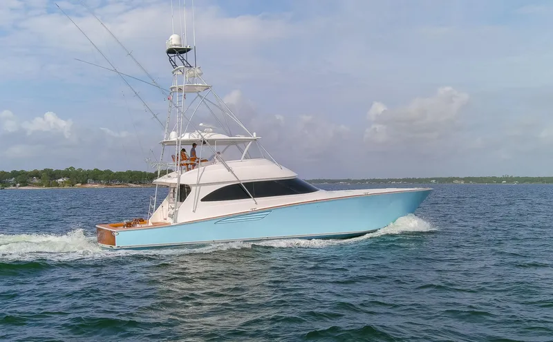 Bandito Yacht Photos Pics 2015 Viking 70 Convertible yacht cruising on open water.