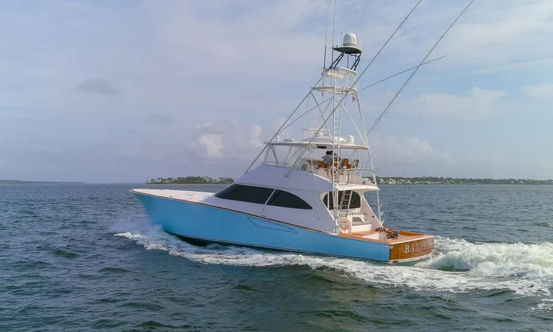 Bandito Yacht Photos Pics 2015 Viking 70 Convertible yacht cruising on open water.