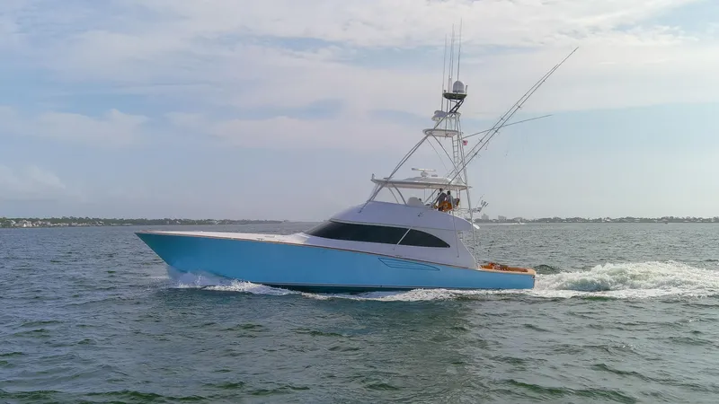 Bandito Yacht Photos Pics 2015 Viking 70 Convertible yacht cruising on open water.