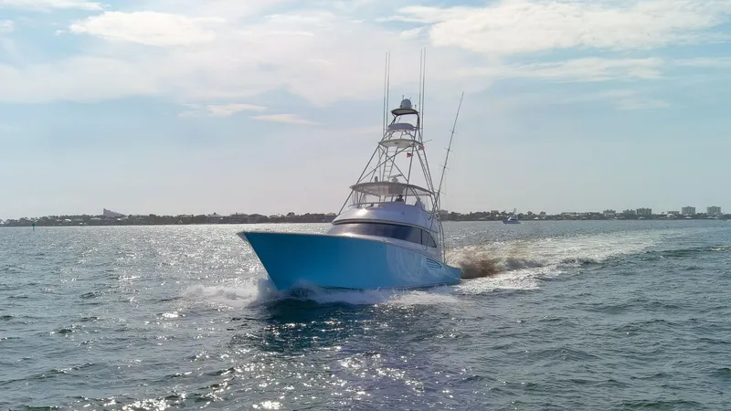 Bandito Yacht Photos Pics 2015 Viking 70 Convertible yacht cruising on open water.