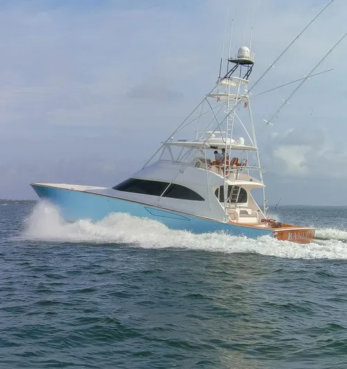 Bandito Yacht Photos Pics 2015 Viking 70 Convertible yacht cruising on open water.