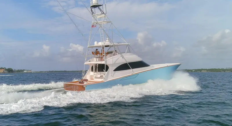 Bandito Yacht Photos Pics 2015 Viking 70 Convertible yacht cruising on open water.