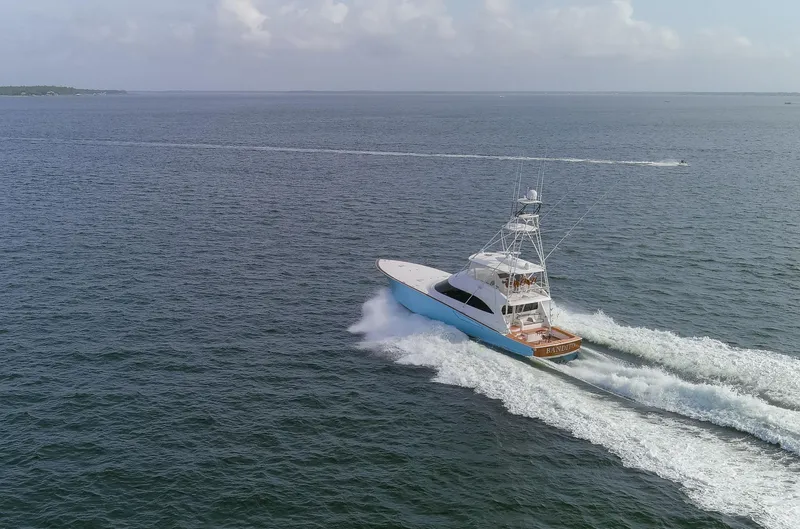 Bandito Yacht Photos Pics 2015 Viking 70 Convertible yacht cruising on open sea.