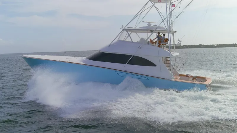 Bandito Yacht Photos Pics 2015 Viking 70 Convertible yacht cruising on open water.