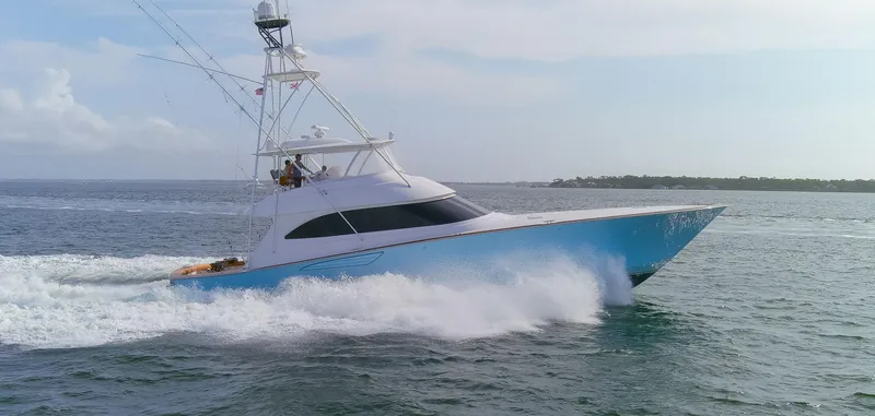 Bandito Yacht Photos Pics 2015 Viking 70 Convertible yacht cruising on open water.