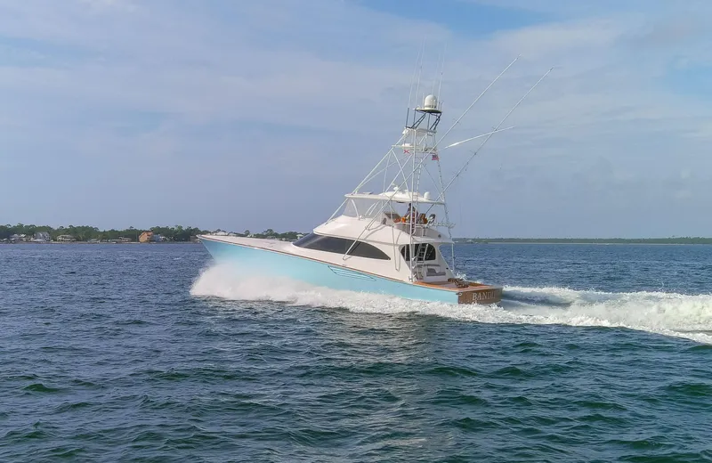 Bandito Yacht Photos Pics 2015 Viking 70 Convertible yacht cruising on open water.