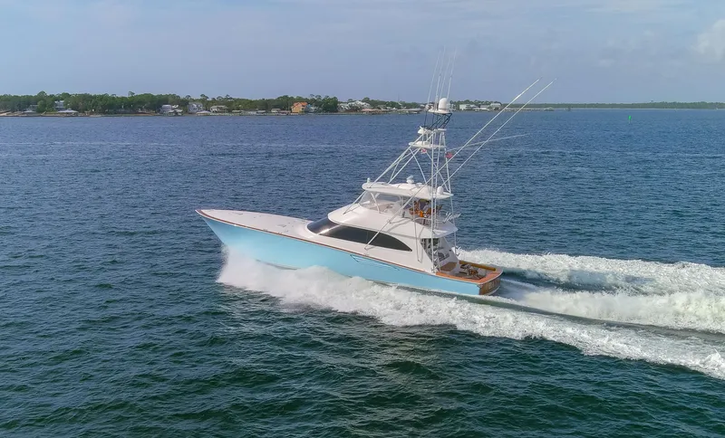 Bandito Yacht Photos Pics 2015 Viking 70 Convertible yacht cruising on open water.