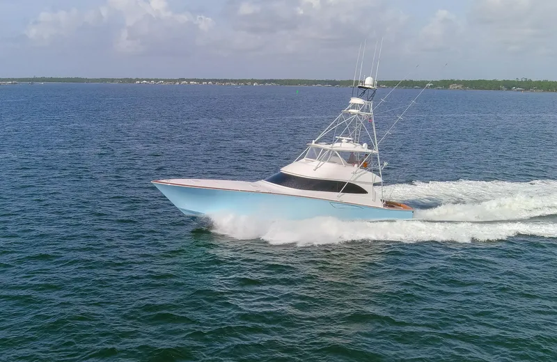 Bandito Yacht Photos Pics 2015 Viking 70 Convertible yacht cruising on open water.