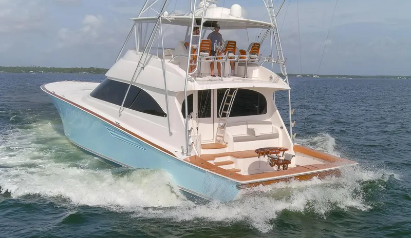 Bandito Yacht Photos Pics 2015 Viking 70 Convertible yacht cruising on open water.