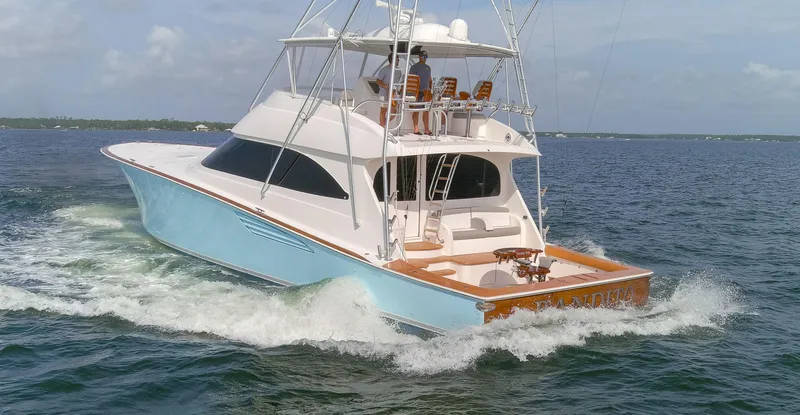 Bandito Yacht Photos Pics 2015 Viking 70 Convertible yacht cruising on open water.