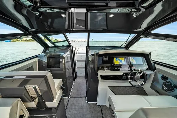  Yacht Photos Pics Interior of 2018 Cobalt A36 boat with modern dashboard and seating.