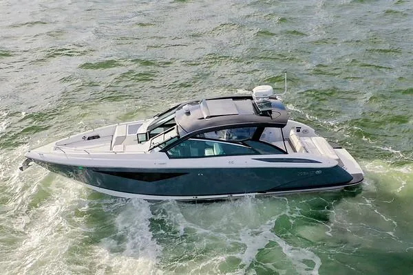  Yacht Photos Pics 2018 Cobalt A36 boat cruising on open water.