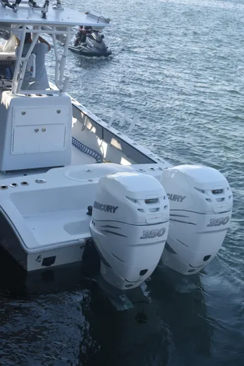 Pamela Ann Yacht Photos Pics 2017 Conch 30 boat with twin Mercury 350 engines on water.