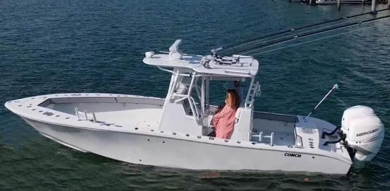 Pamela Ann Yacht Photos Pics A 2018 Conch 30 boat with a Mercury engine cruising on the water.