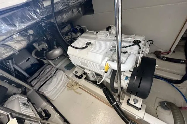  Yacht Photos Pics Engine room of 2013 Uniesse 49 EXPRESS yacht, showcasing clean, organized machinery.