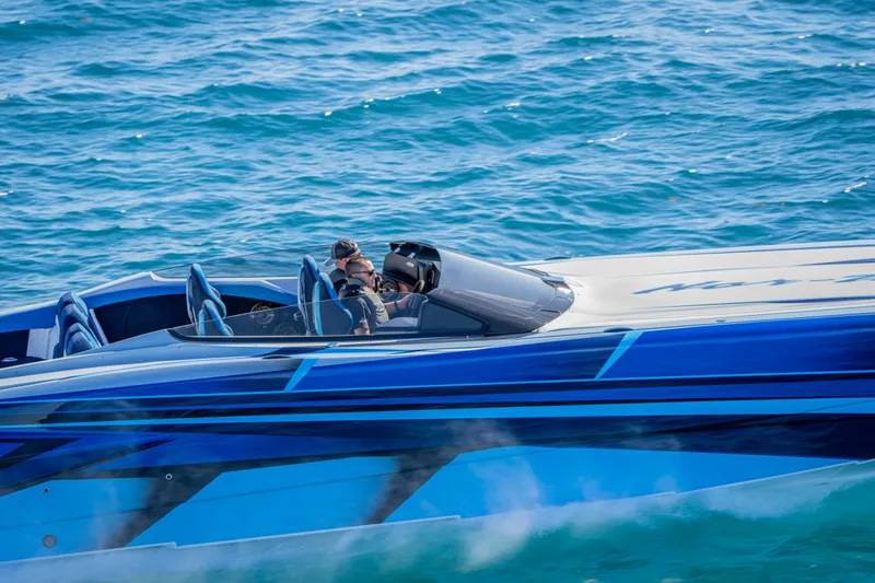  Yacht Photos Pics 2026 Nor-Tech 4000 Super Catamaran cruising on blue ocean waters.