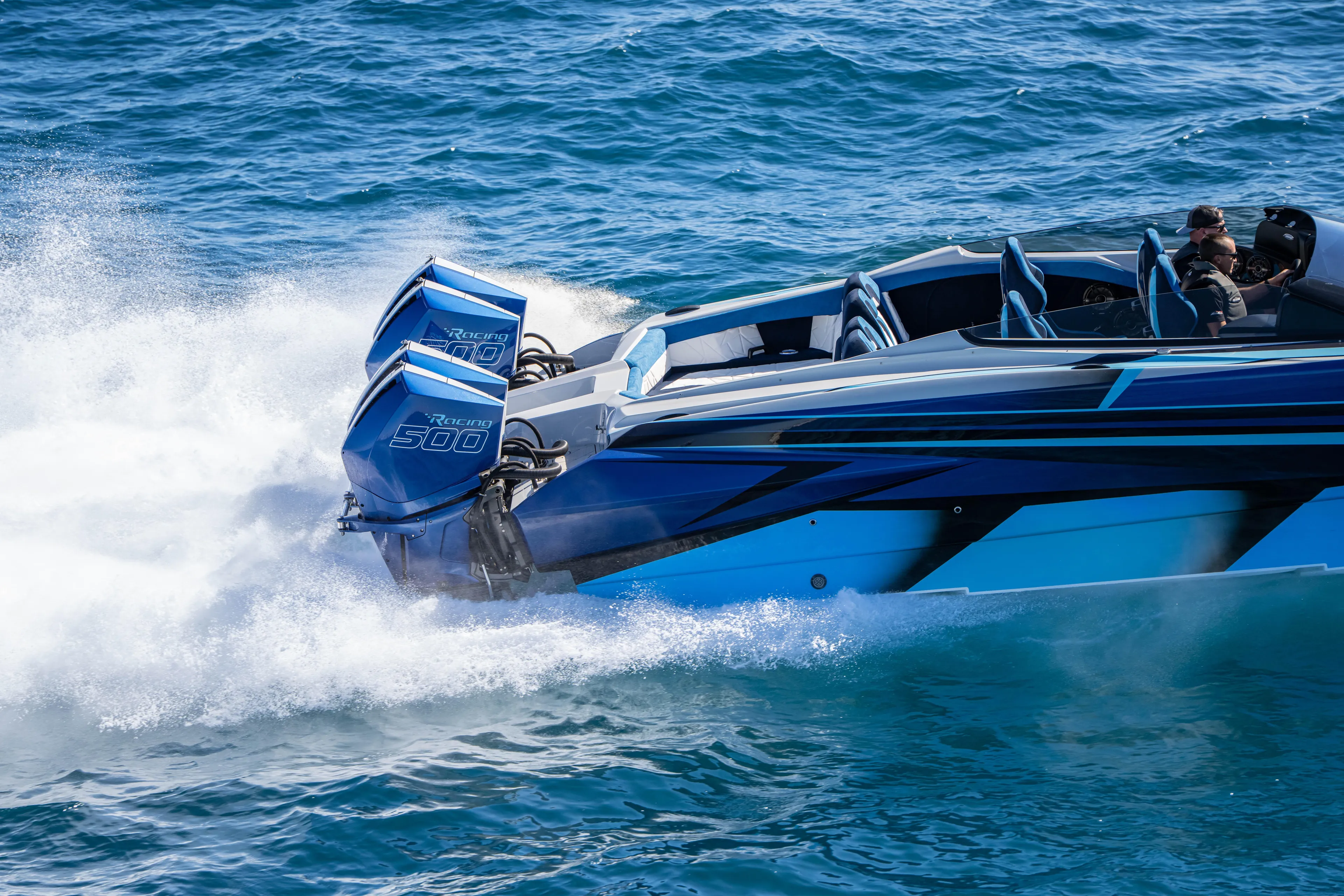  Yacht Photos Pics 2026 Nor-Tech 4000 Super Catamaran speeding on ocean with twin 500 engines.