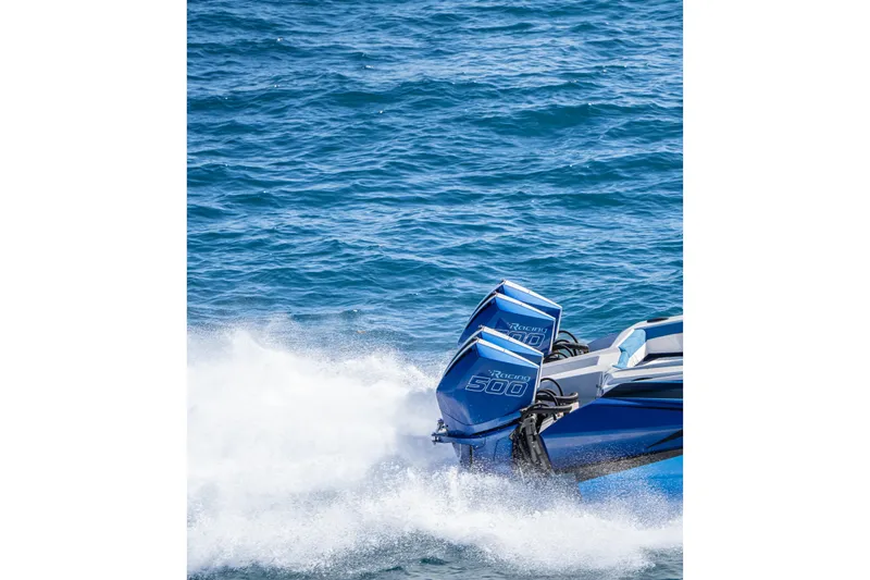  Yacht Photos Pics 2026 Nor-Tech 4000 Super Catamaran with twin Racing 500 engines on blue ocean.