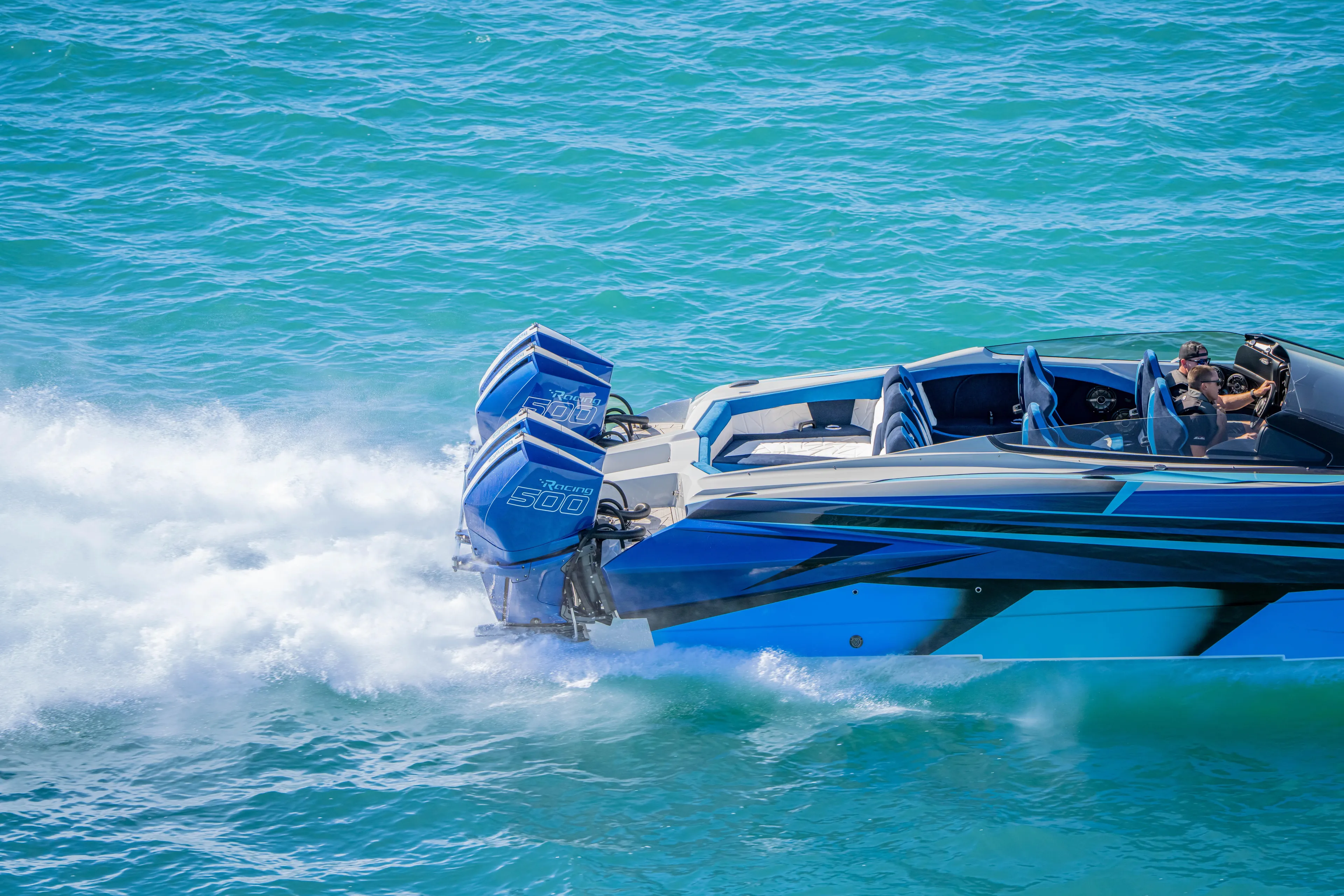  Yacht Photos Pics 2026 Nor-Tech 4000 Super Catamaran speeding on blue ocean waters.