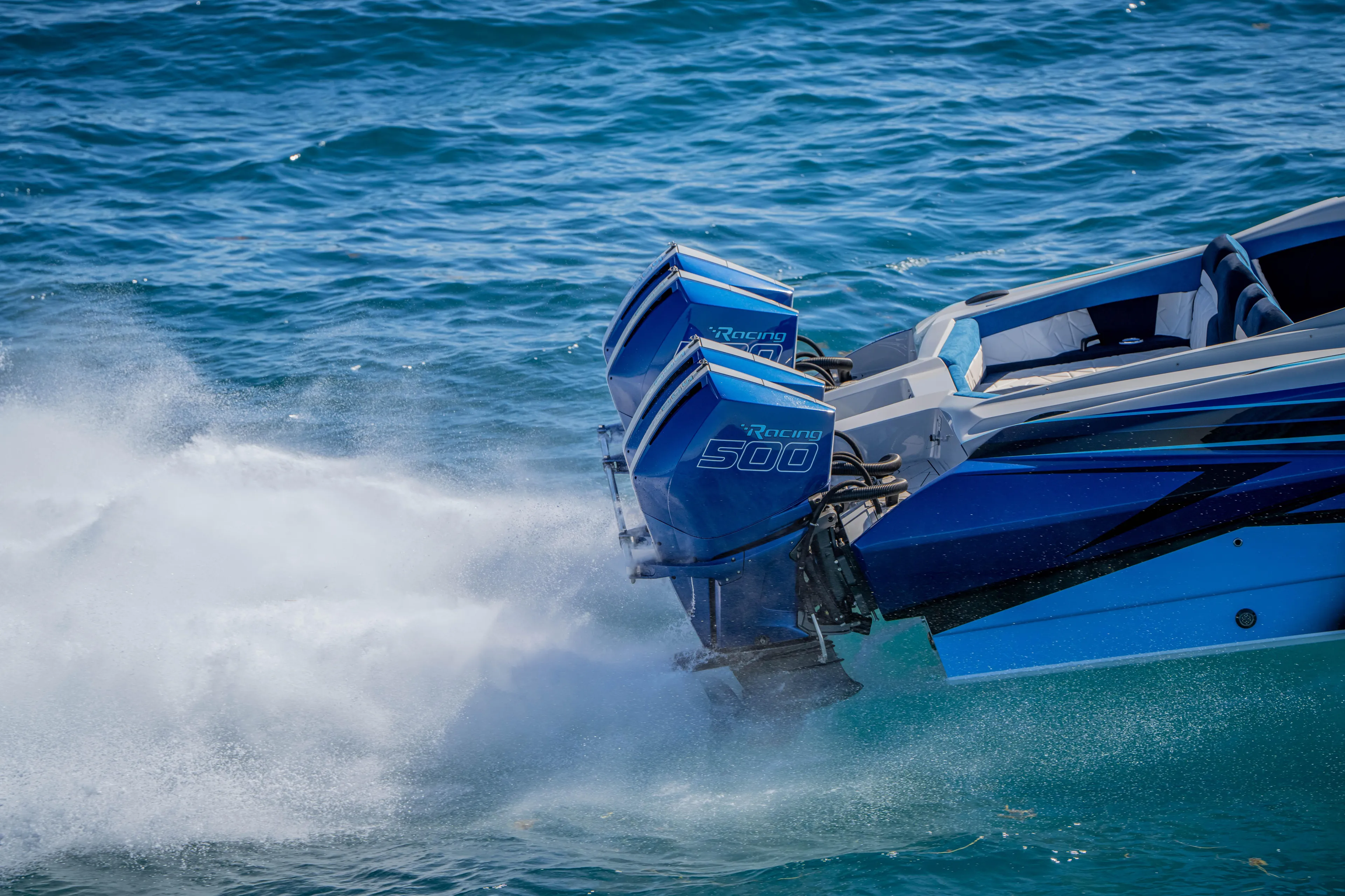  Yacht Photos Pics 2026 Nor-Tech 4000 Super Catamaran with dual Racing 500 engines on blue ocean.