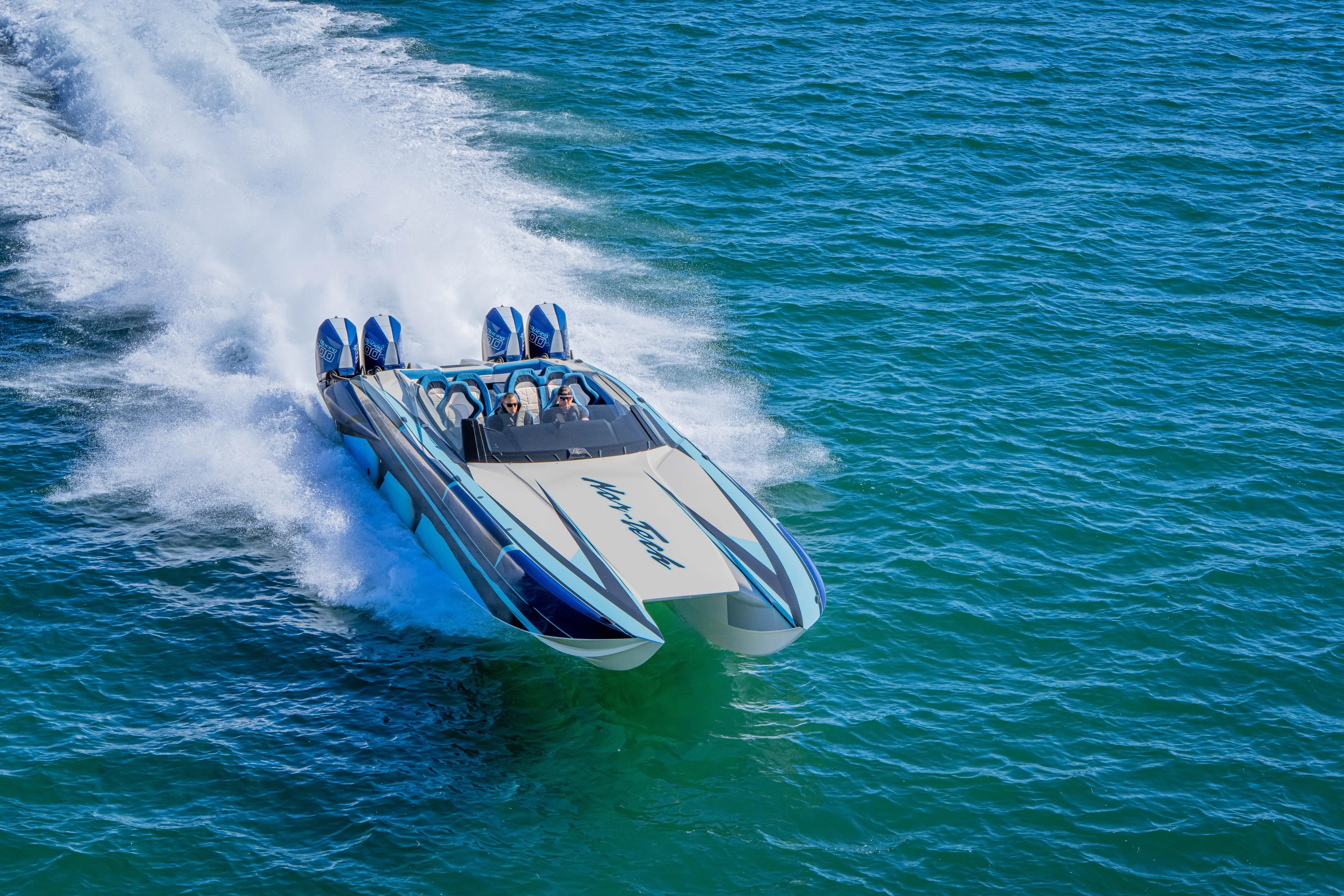  Yacht Photos Pics 2026 Nor-Tech 4000 Super Catamaran speeding on open water.