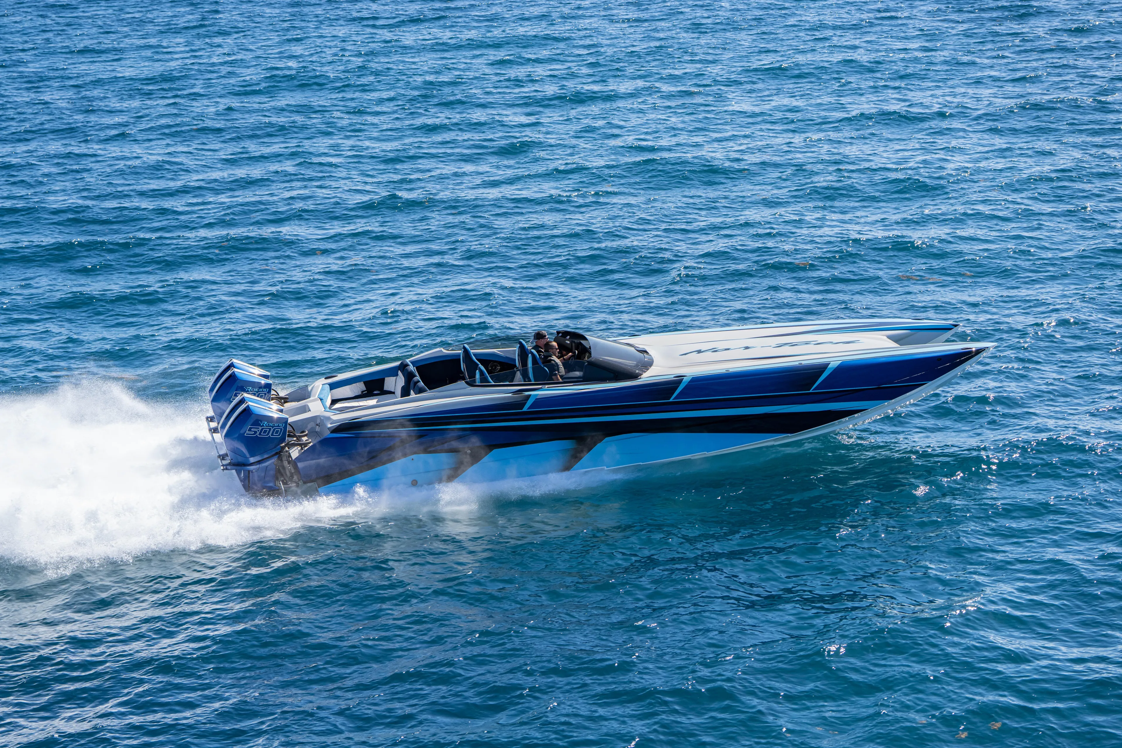  Yacht Photos Pics 2026 Nor-Tech 4000 Super Catamaran speeding on open water.