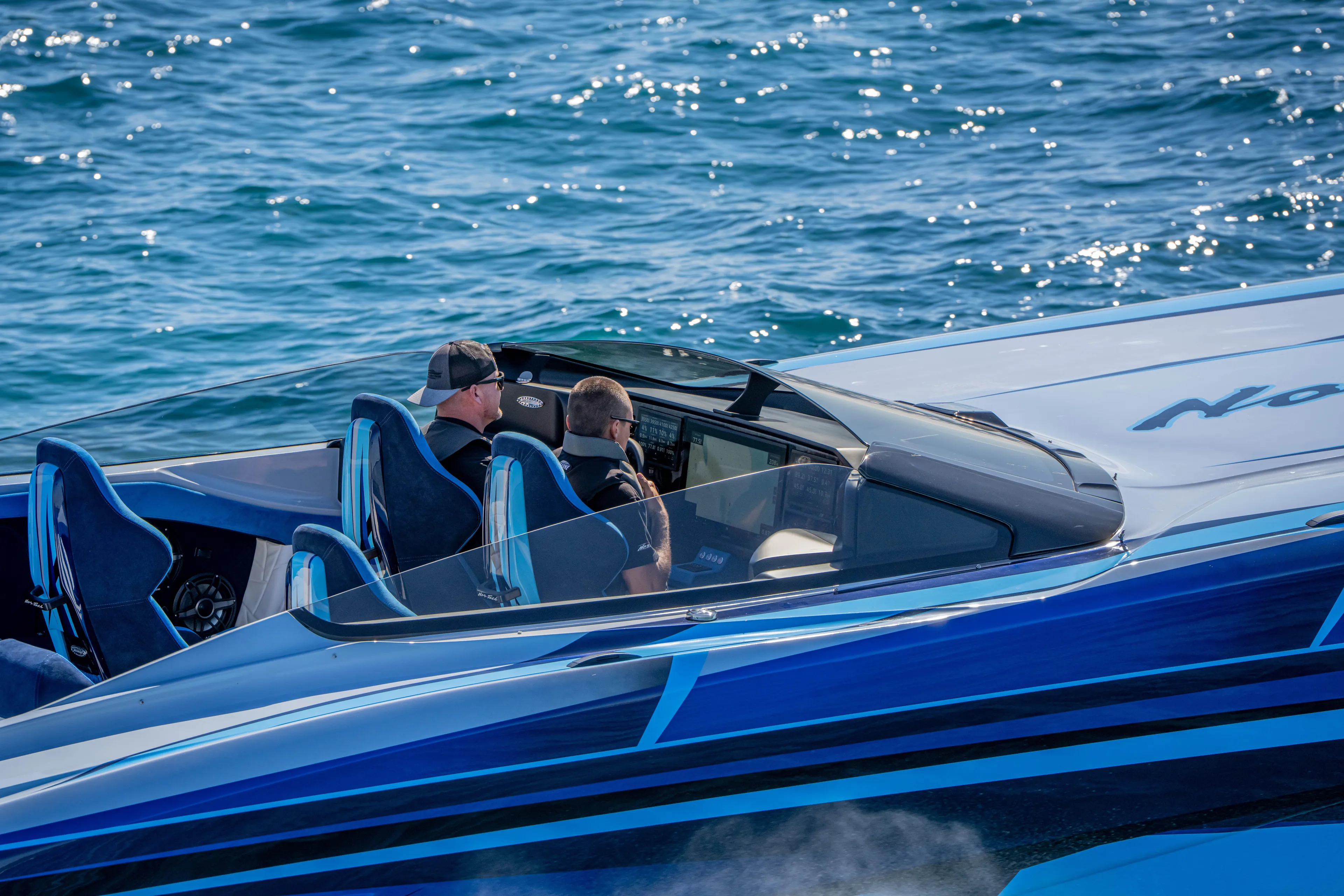  Yacht Photos Pics 2026 Nor-Tech 4000 Super Catamaran cruising on blue ocean waters.