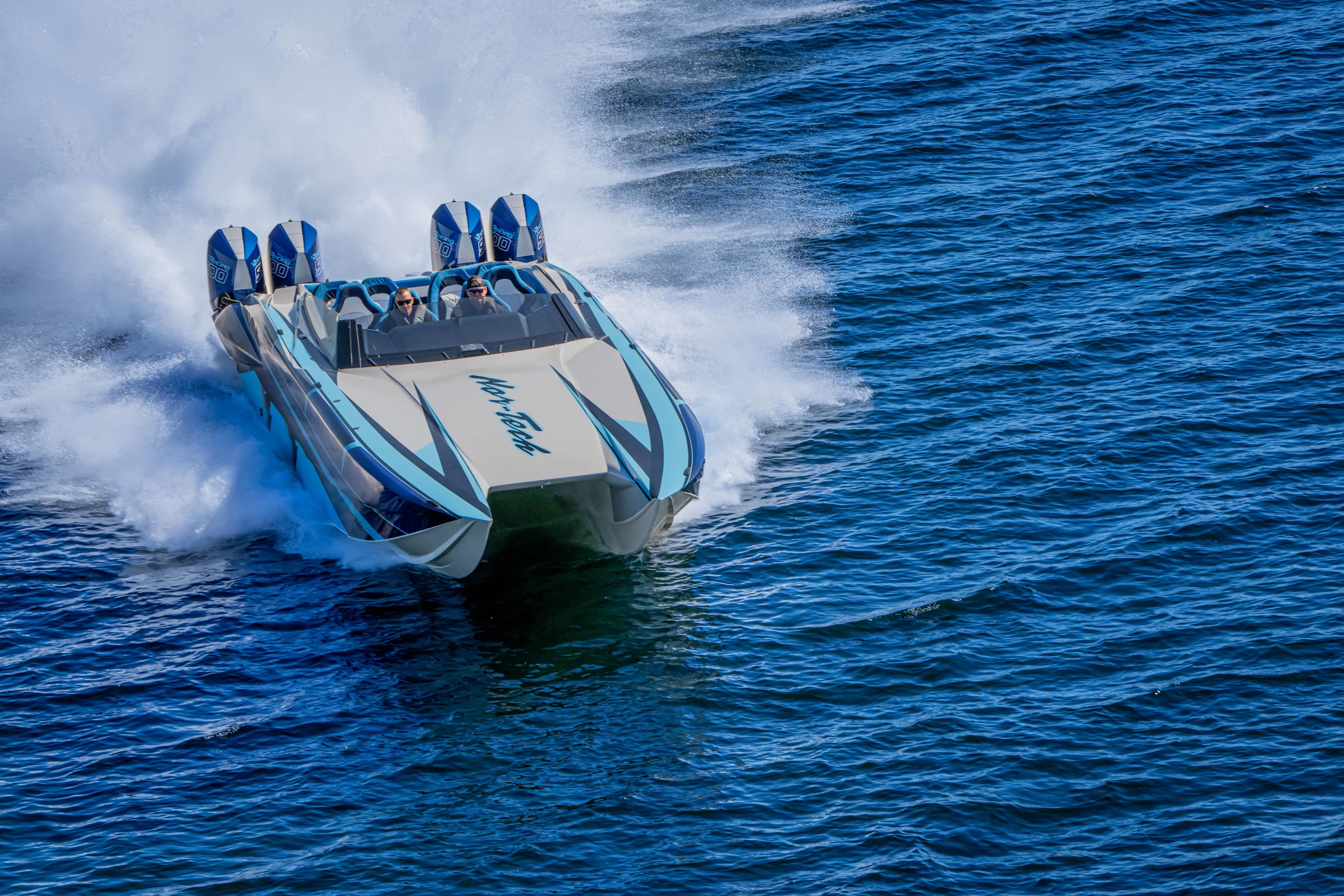  Yacht Photos Pics 2026 Nor-Tech 4000 Super Catamaran speeding on open water.