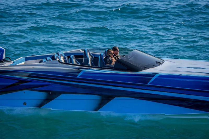  Yacht Photos Pics 2026 Nor-Tech 4000 Super Catamaran cruising on blue ocean waters.