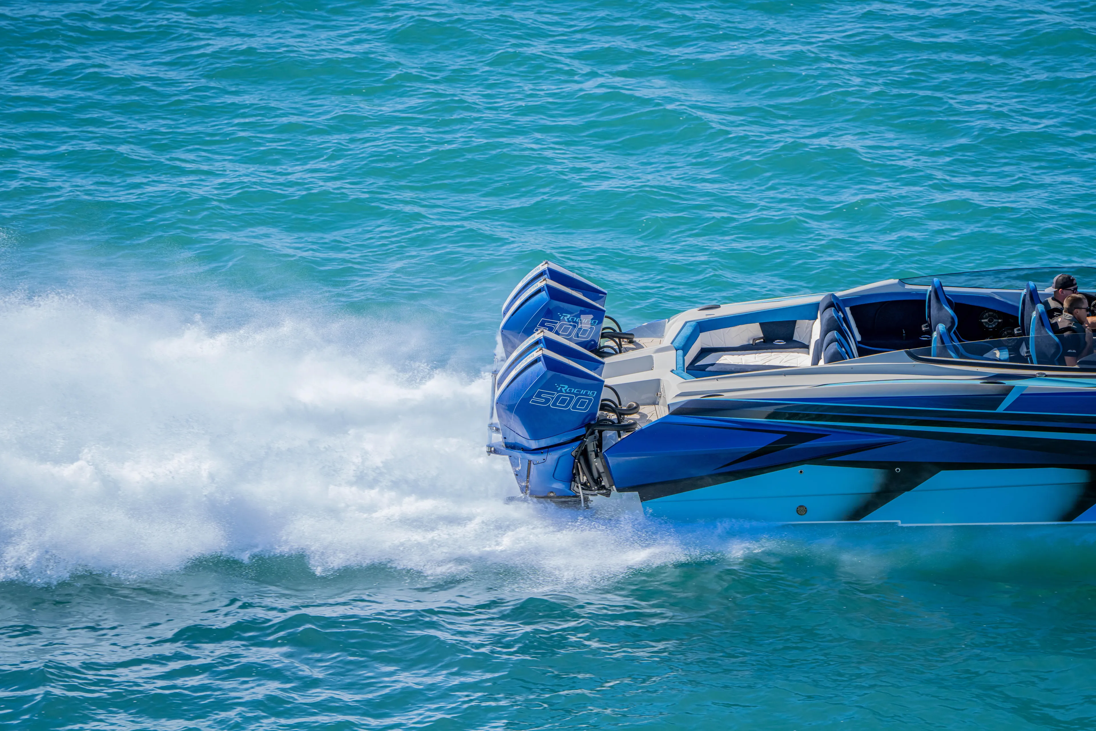  Yacht Photos Pics 2026 Nor-Tech 4000 Super Catamaran speeding on blue ocean waters.