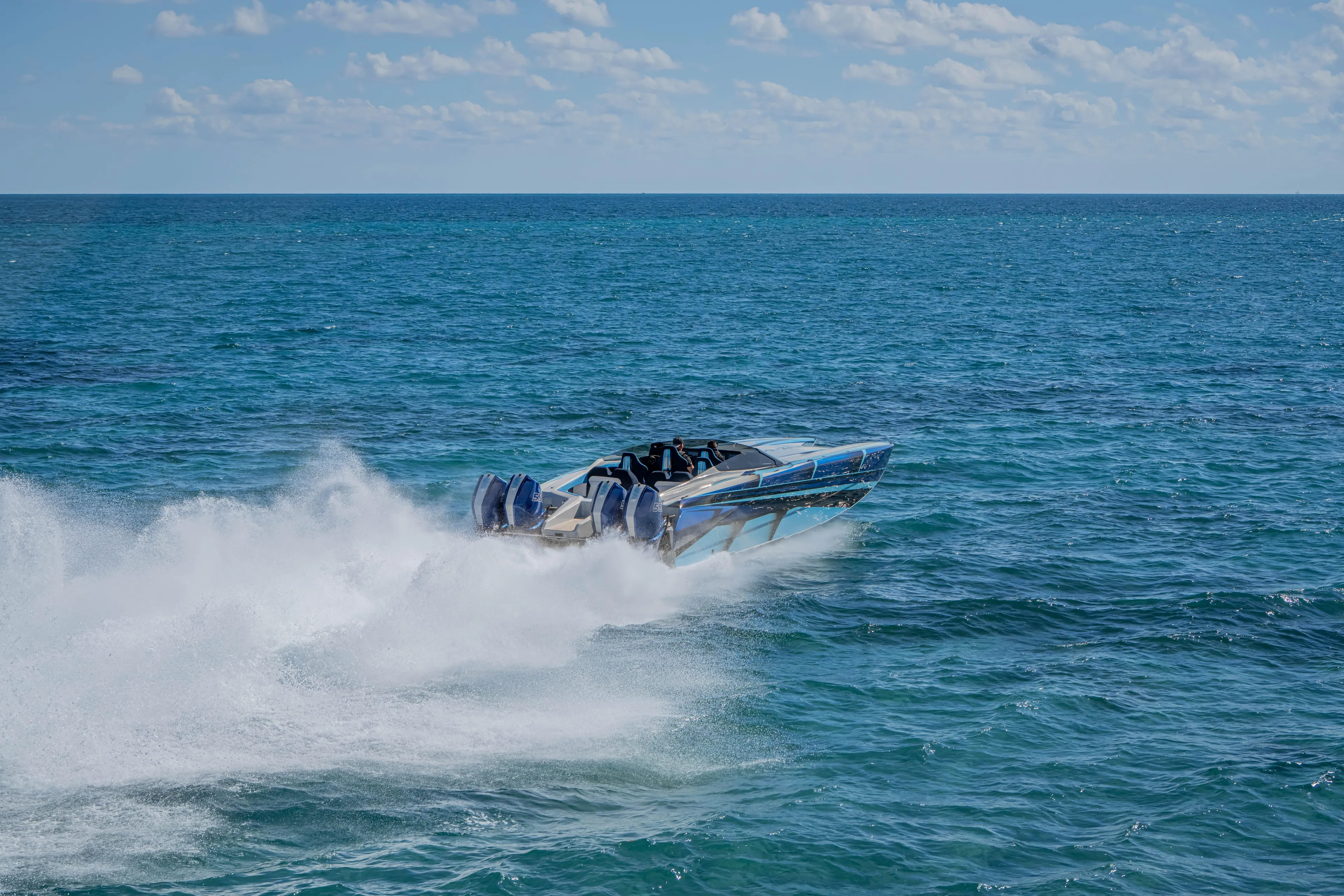  Yacht Photos Pics 2026 Nor-Tech 4000 Super Catamaran speeding on open ocean waters.