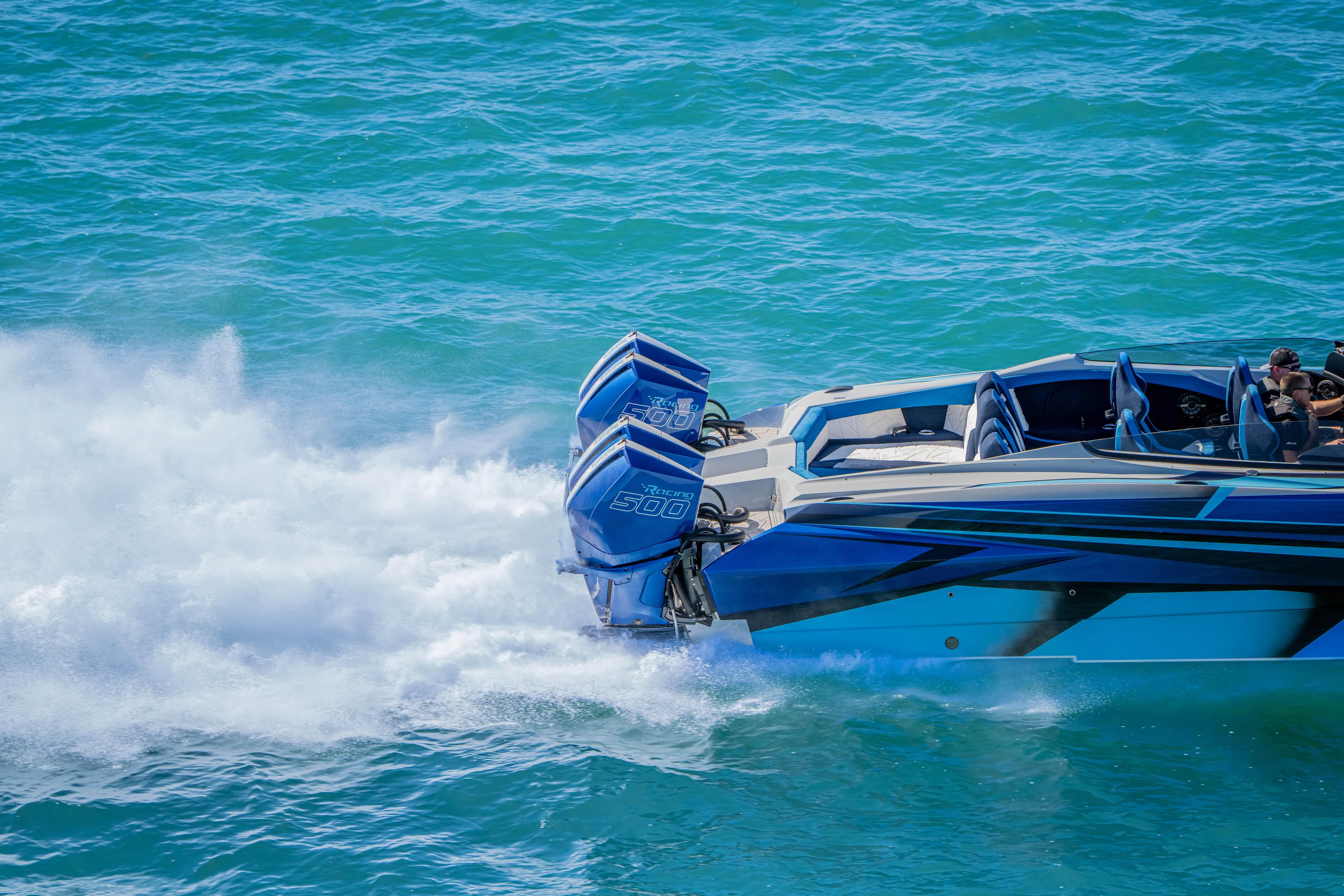  Yacht Photos Pics 2026 Nor-Tech 4000 Super Catamaran speeding on blue ocean waters.