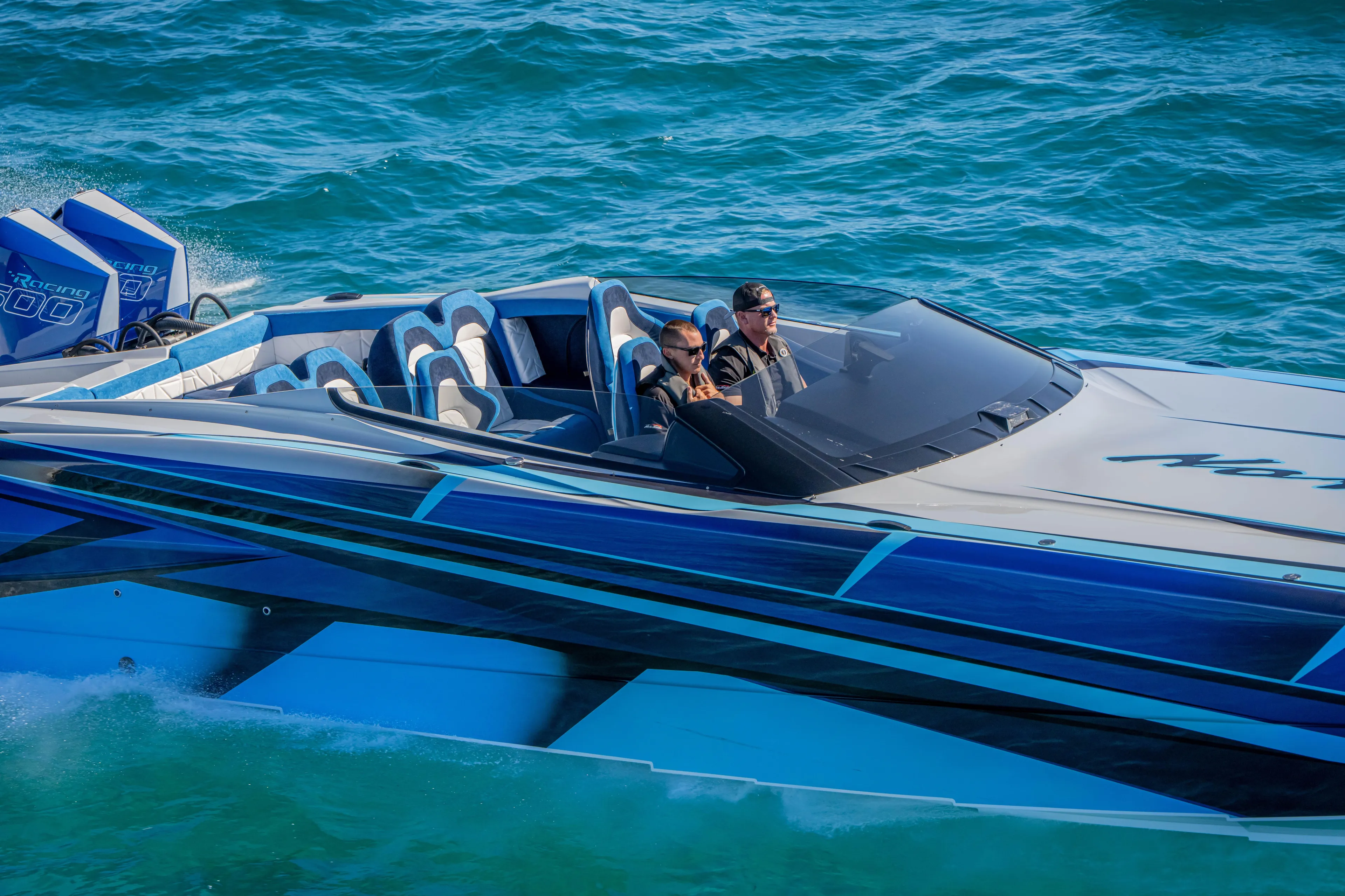  Yacht Photos Pics 2026 Nor-Tech 4000 Super Catamaran cruising on blue ocean waters.