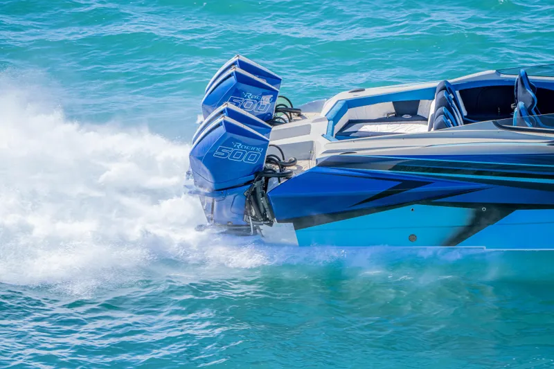  Yacht Photos Pics 2026 Nor-Tech 4000 Super Catamaran with twin Racing 500 engines on blue water.