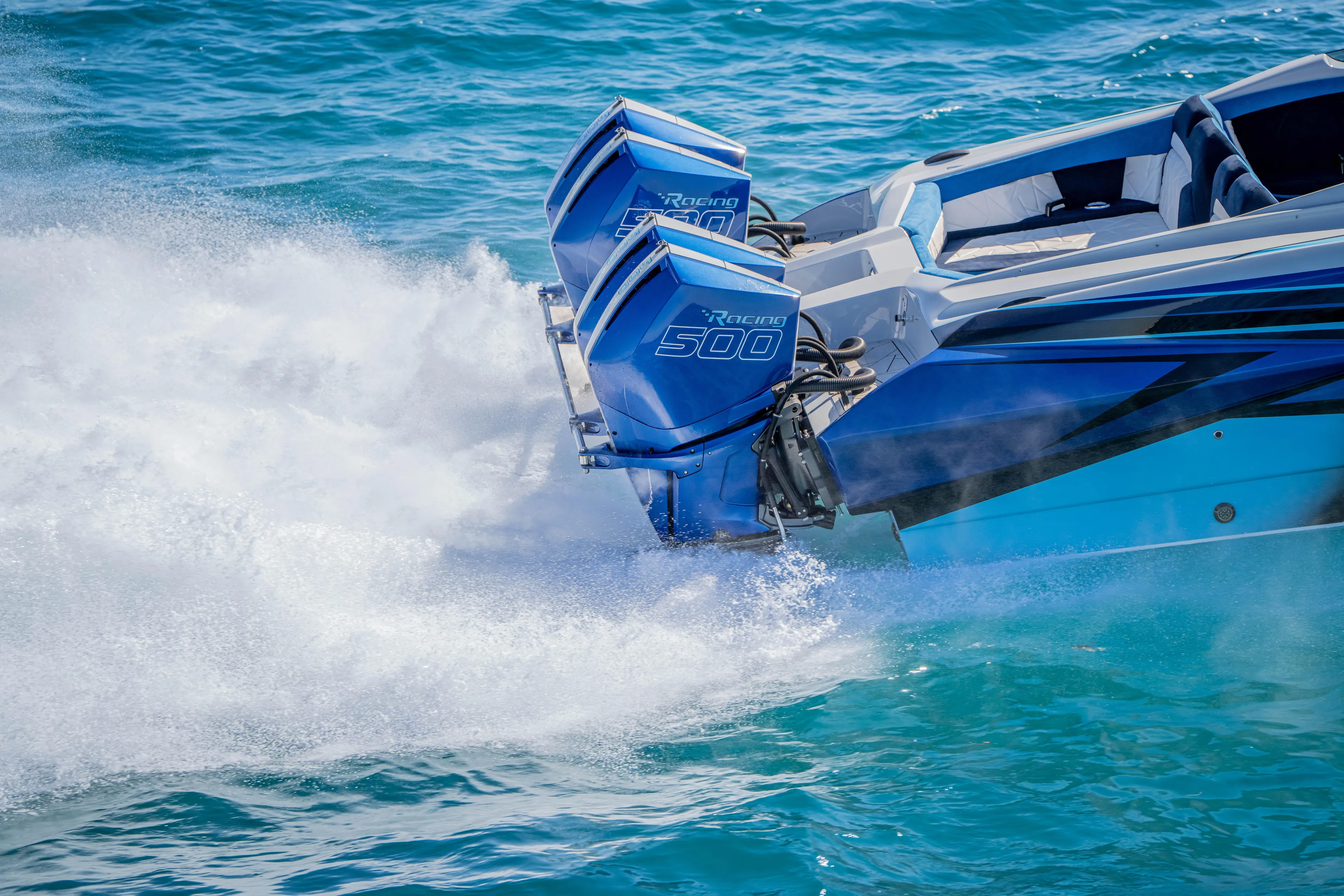  Yacht Photos Pics 2026 Nor-Tech 4000 Super Catamaran with dual Racing 500 engines on turquoise water.