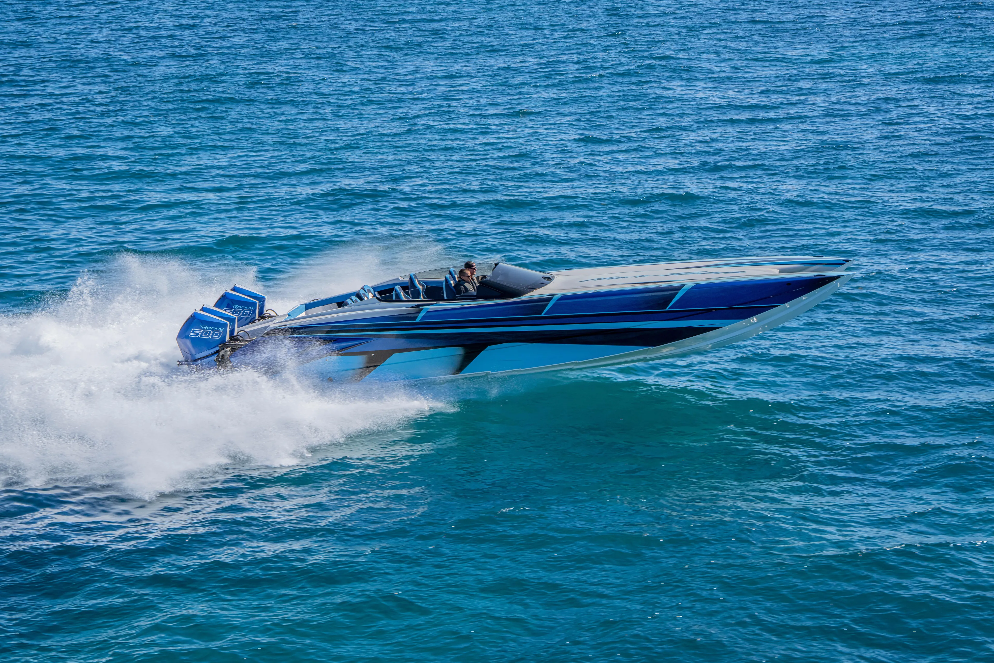  Yacht Photos Pics 2026 Nor-Tech 4000 Super Catamaran speeding on open water.