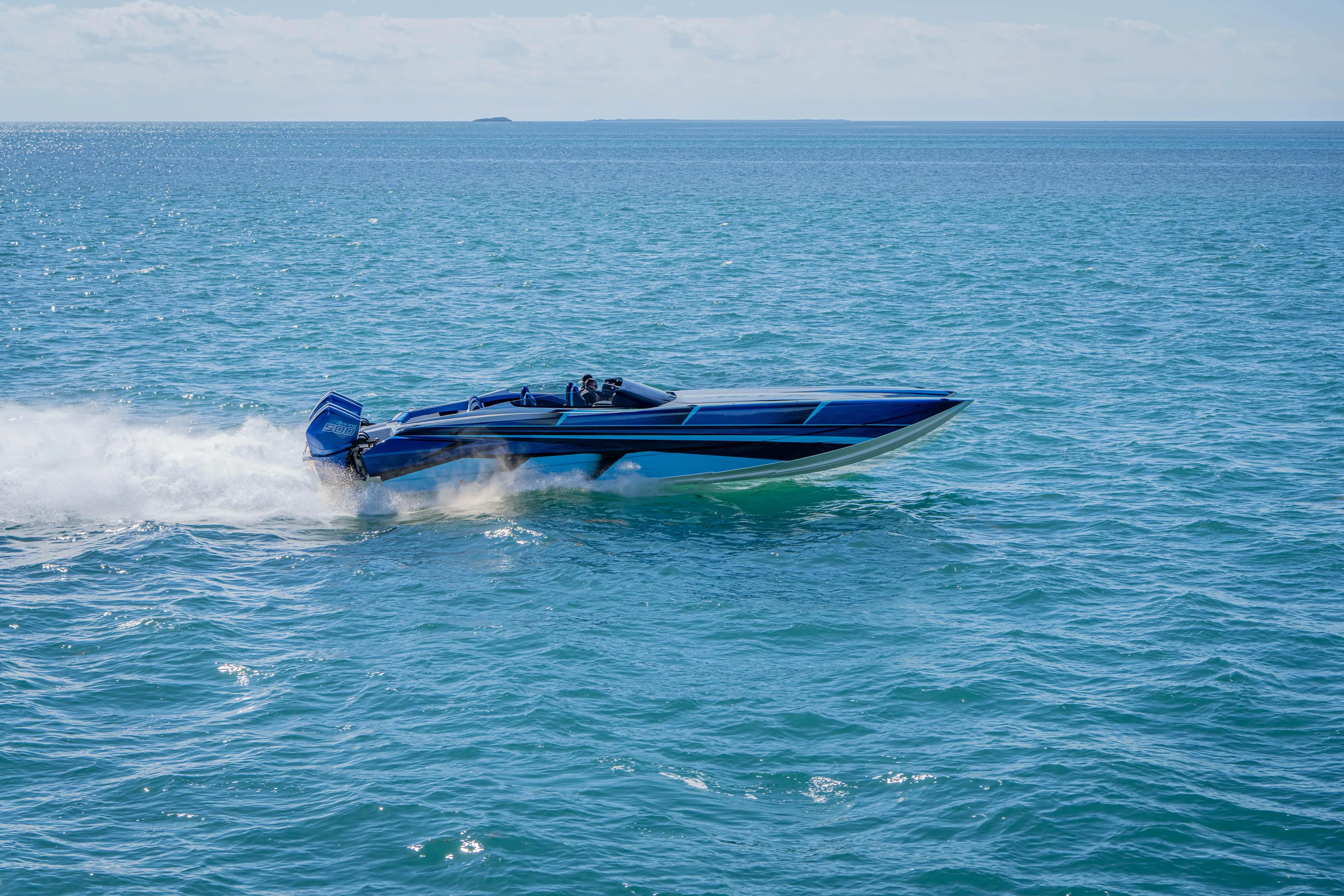  Yacht Photos Pics 2026 Nor-Tech 4000 Super Catamaran speeding on open water.