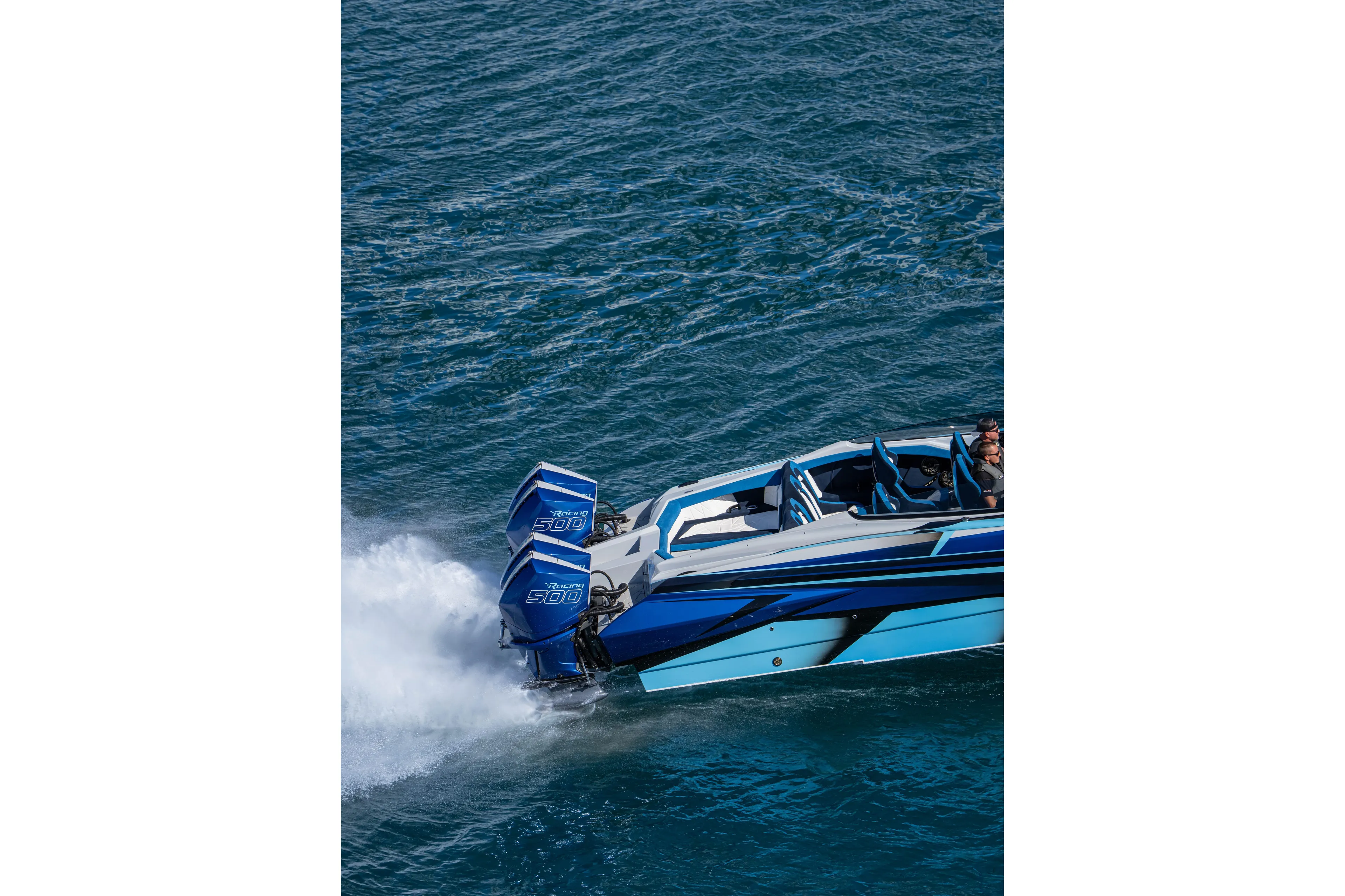  Yacht Photos Pics 2026 Nor-Tech 4000 Super Catamaran speeding on water with powerful engines.