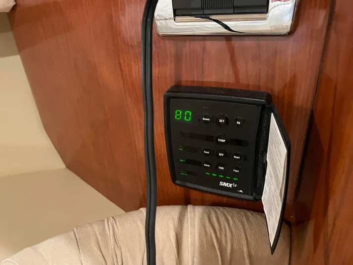  Yacht Photos Pics Control panel on a 2003 Sea Ray 380 Sundancer boat interior.