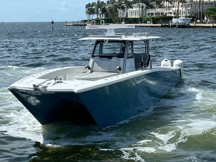 Nomad Yacht Photos Pics 2021 Freeman 42 LR boat on water, featuring sleek design and modern equipment.