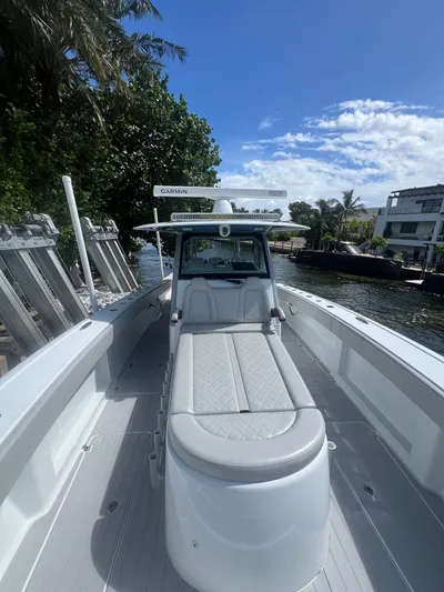 Nomad Yacht Photos Pics 2021 Freeman 42 LR boat with sleek design, docked by a scenic waterfront.
