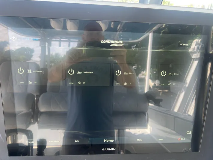 Nomad Yacht Photos Pics Garmin marine display on Freeman 42 LR, 2021, showing Lumishore lighting controls.