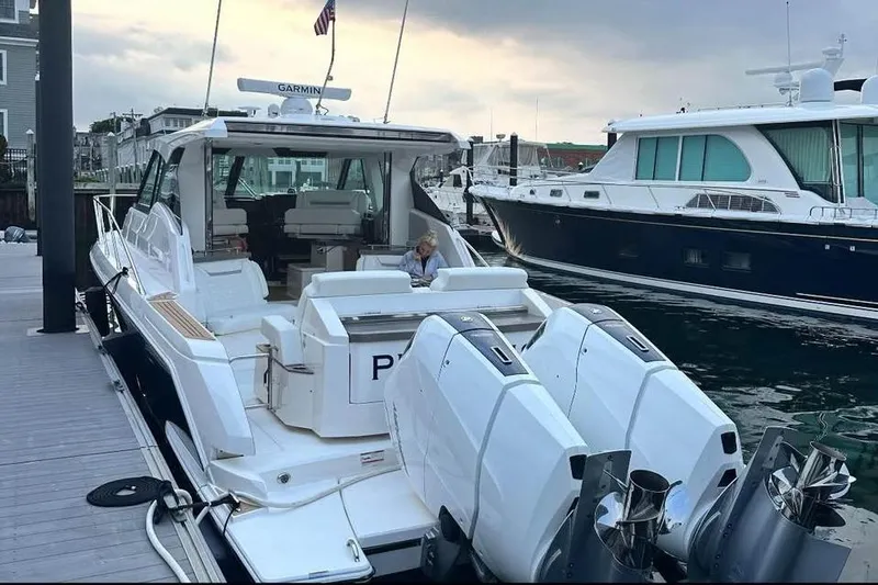 Motivated!! Only 113 Hours Yacht Photos Pics 2023 Tiara Yachts 43 LE docked, featuring dual outboard engines and spacious seating.