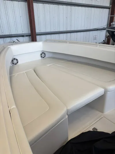 Gabrielle Yacht Photos Pics Jupiter 31 CC FWD seating area, 2006, in a storage facility.