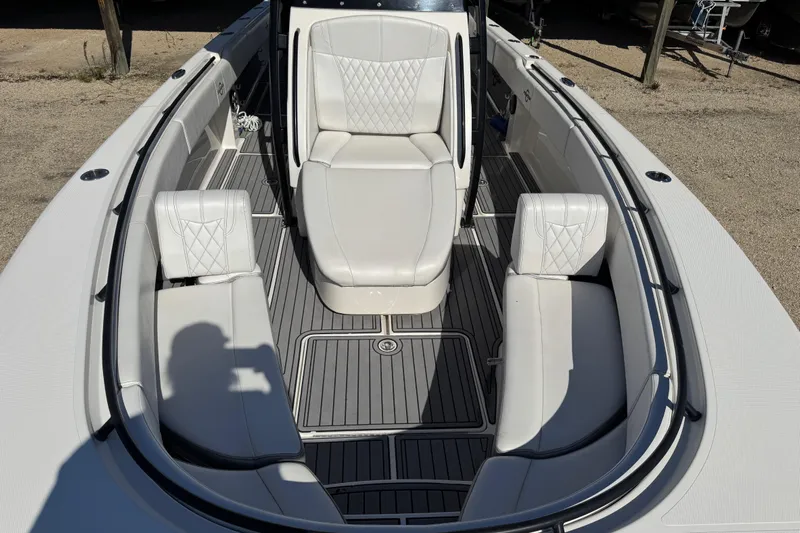  Yacht Photos Pics 2019 Fountain 34 Center Console boat with white seating and sleek design.