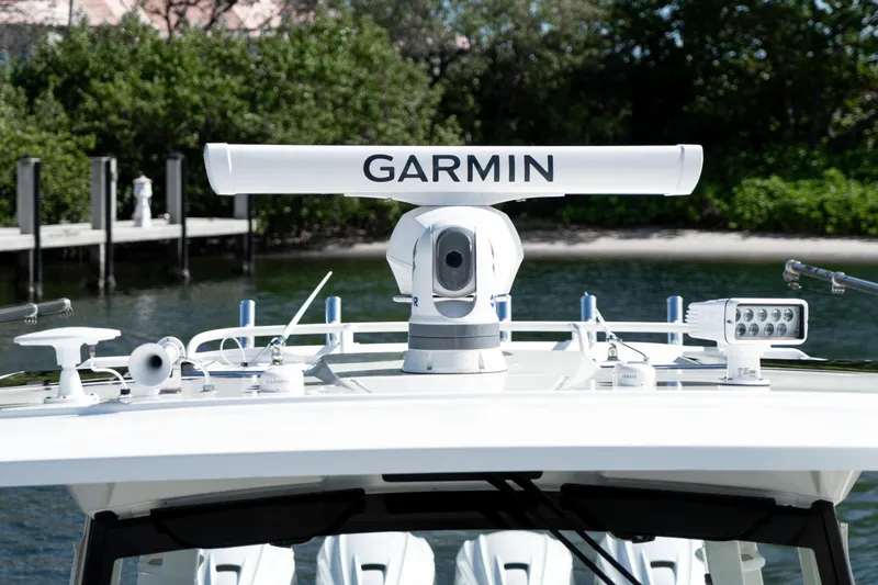 Nomad Yacht Photos Pics 2022 Pursuit S 428 Sport boat with Garmin radar system on top.