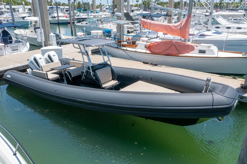  Yacht Photos Pics 2023 Sea Water PHANTOM 280 boat docked at marina, featuring sleek design and twin engines.
