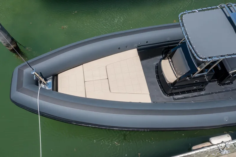  Yacht Photos Pics 2023 Sea Water PHANTOM 280 boat, aerial view, docked in green water.